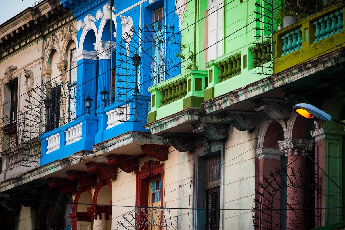 cintrocuba's tweet photo. Traveling along the streets of #Cuba one can not help but notice the large number of #colorful and diverse #balconies that line the sides of #roads and #streets, wrapped with beautiful fern and decorated with colorful paints and varying architectural designs.
 #cintrocuba https://t.co/q9VR1EfUHM