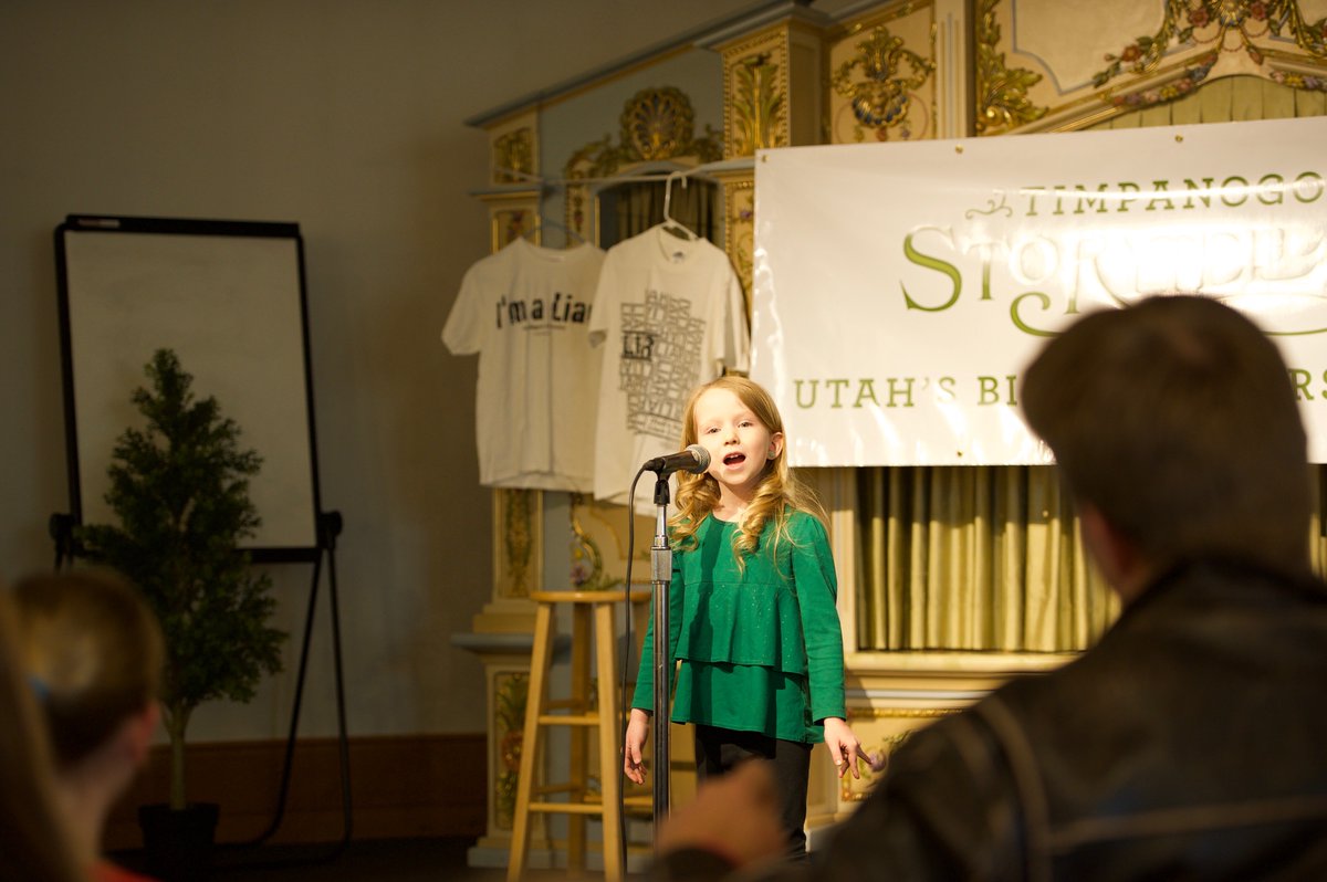 OremLibrary's tweet photo. Timpanogos Storytelling Festival celebrated the 10th Anniversary of the Utahβs Biggest Liars Contest at the library last night and it was a fun night for all! Special thanks to special guest judge and performer Bil Lepp, and all the participants! #TimpFest #BilLepp #OPLPrograms https://t.co/FVnBpApgkV