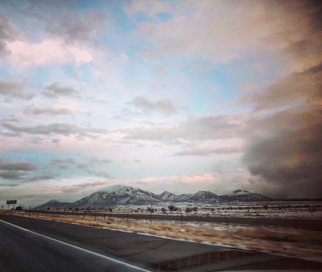 Within 61 miles I drove through a heatwave, a thunderstorm, a snow storm, and two rainbows. This is definitely part of why New Mexico is called the Land of Enchantment!  #landofenchantment #newmexico #followtherainbow #stoptakingphotoswhiledriving <a href="/i25studios/">I-25 Studios</a>