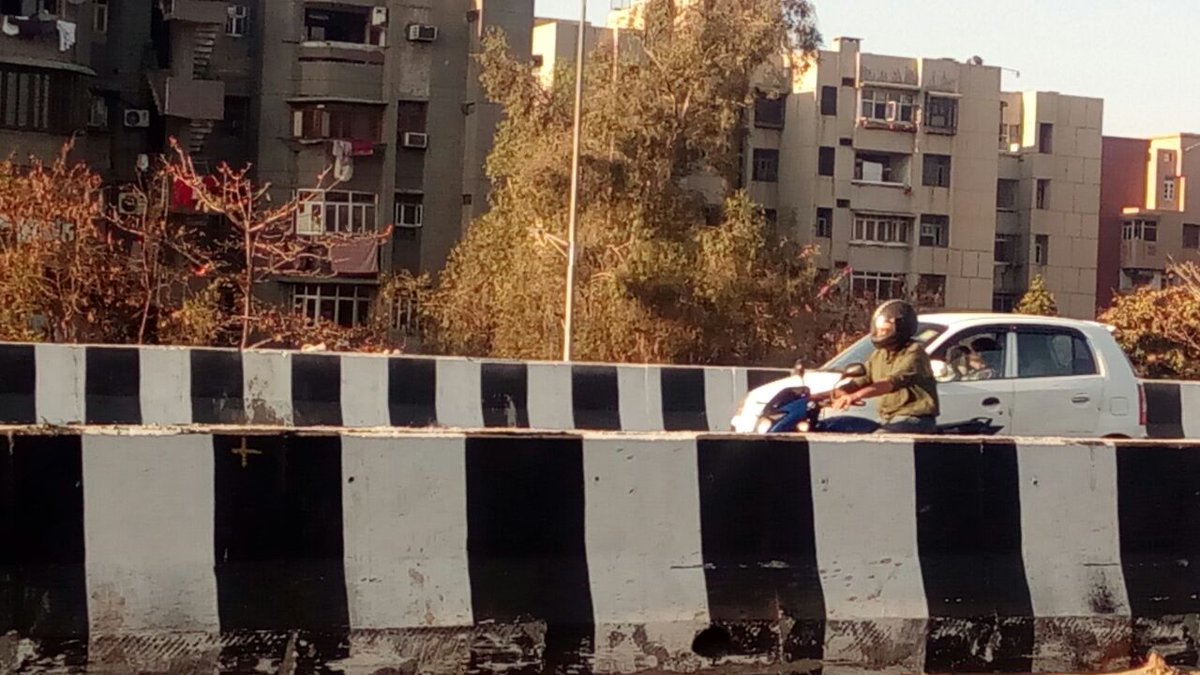 Dsurya0077's tweet photo. @NHAISocialmedia @nitin_gadkari @dtptraffic This is the ground reality of NH-24. The newely constructed road. Can see the construciton quality between Motherdairy to mayur vihar phase-2 trench. this pics opens the black face of ignorance and professionalism of Highway authority https://t.co/jvWcT5w7zi