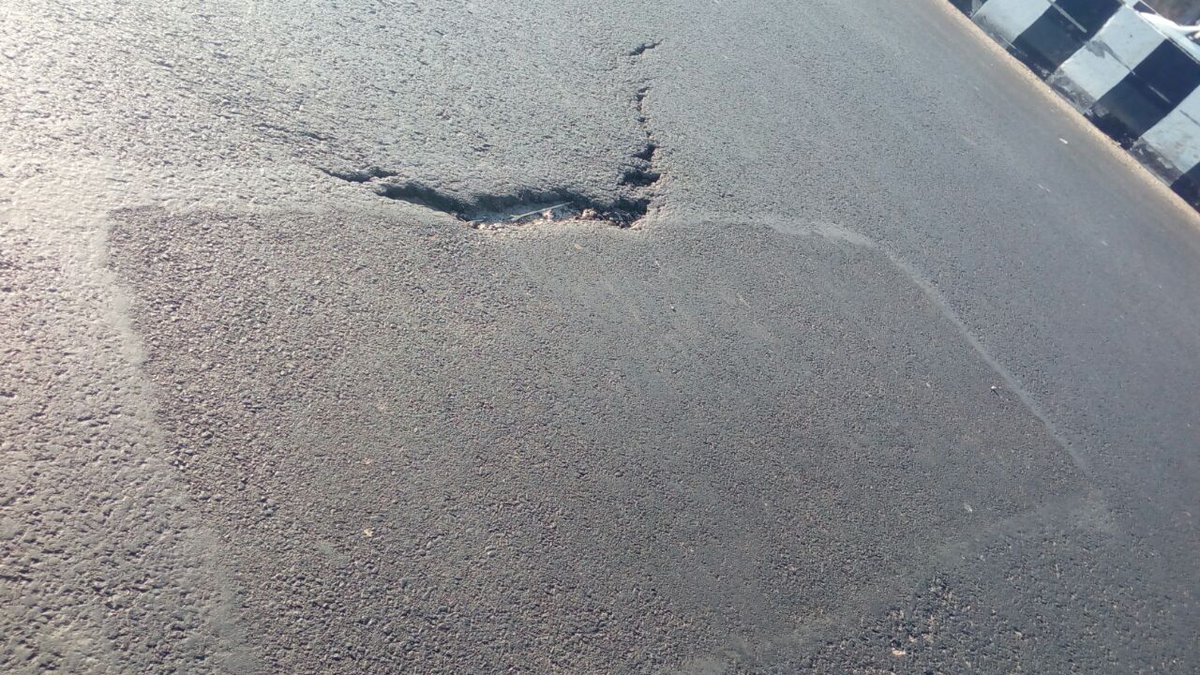 Dsurya0077's tweet photo. @NHAISocialmedia @nitin_gadkari @dtptraffic This is the ground reality of NH-24. The newely constructed road. Can see the construciton quality between Motherdairy to mayur vihar phase-2 trench. this pics opens the black face of ignorance and professionalism of Highway authority https://t.co/jvWcT5w7zi
