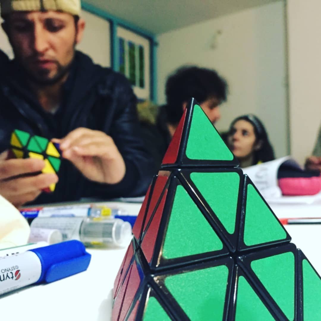 OCC_Project's tweet photo. The girls of @rubikids are already at #Polykastro offering a workshop for all the #teenagers and #children of #OCC who want to learn how to do the #rubikpyramid 🔺😉 https://t.co/GV0qgWmZKA