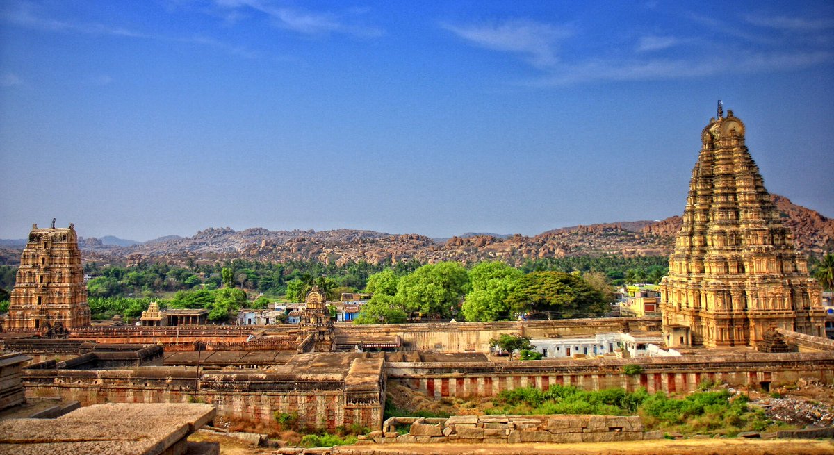views_indian's tweet photo. Hampi, capital of the Vijayanagara empire, sits on the banks of the Tungabhadra River. #VirupakshaTemple is the main center of pilgrimage at Hampi, and had been considered the most sacred sanctuary over the centuries @india_sydney https://t.co/ADlaZBiZ91