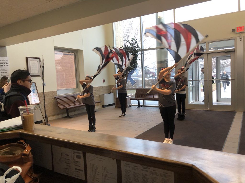 WTClarkeMS's tweet photo. Color Me Happy 😊 
Color me grey and maroon! CMS Color guard welcomes us to school today!  @emeadowschools #MIOSM #flagspinning https://t.co/K0aZQigeHQ
