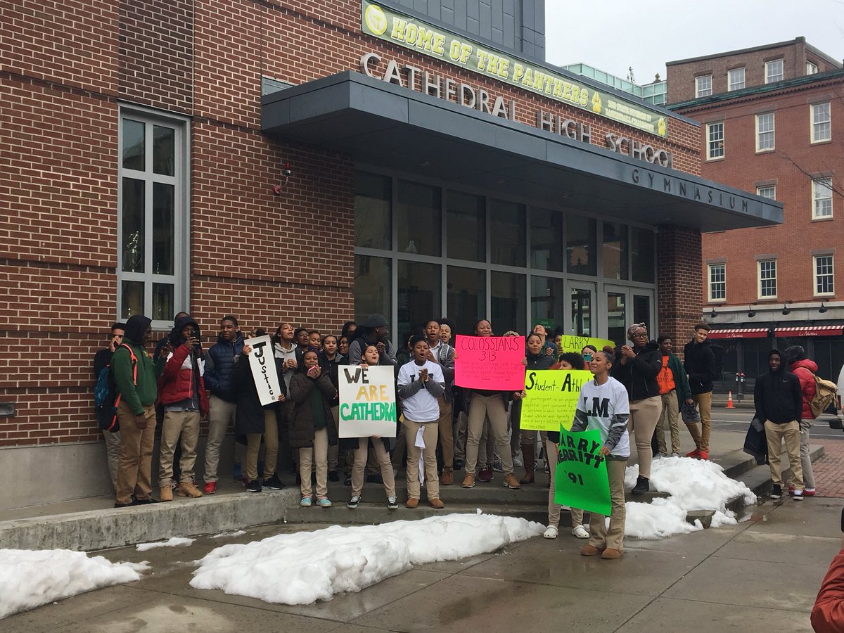 Students have walked out of class at Cathedral High School to protest the recent firing of athletic director Larry Merritt. #wcvb
