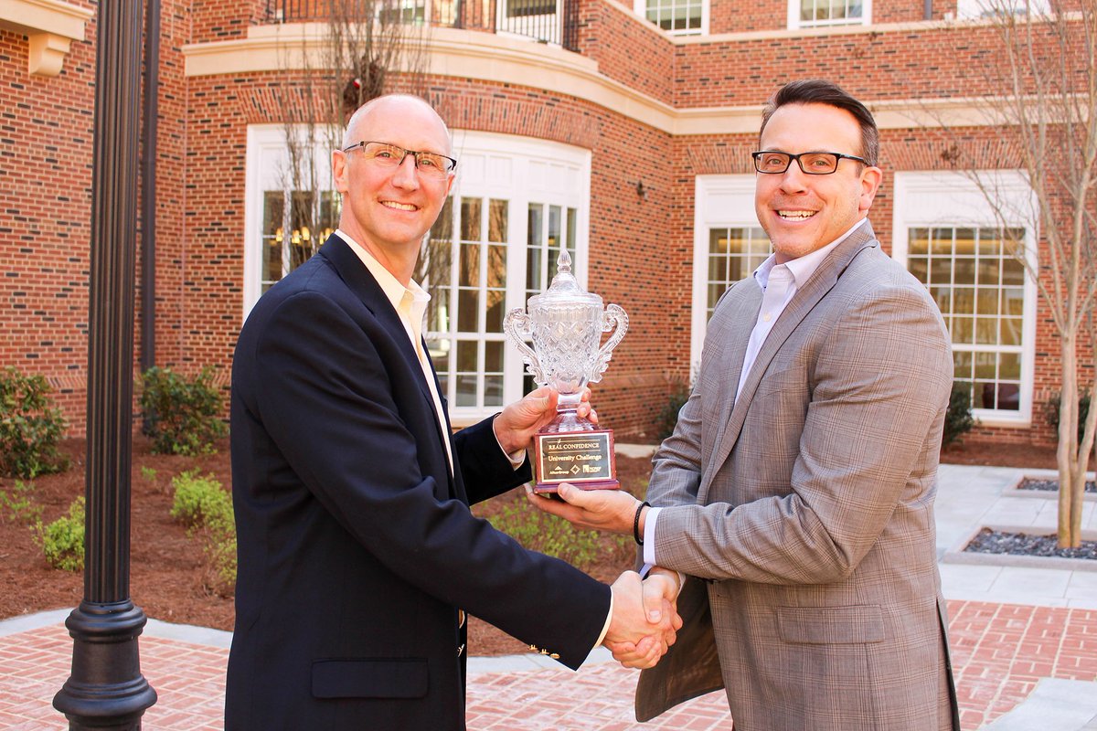 .<a href="/ChuckDirocco/">Chuck DiRocco</a> awarding the University of Georgia team with their first place award for the 2017 Real Confidence University Challenge. Congratulations <a href="/universityofga/">UGA</a>! <a href="/RealConfidence1/">Real Confidence CRE</a> bit.ly/2HxkZoK
