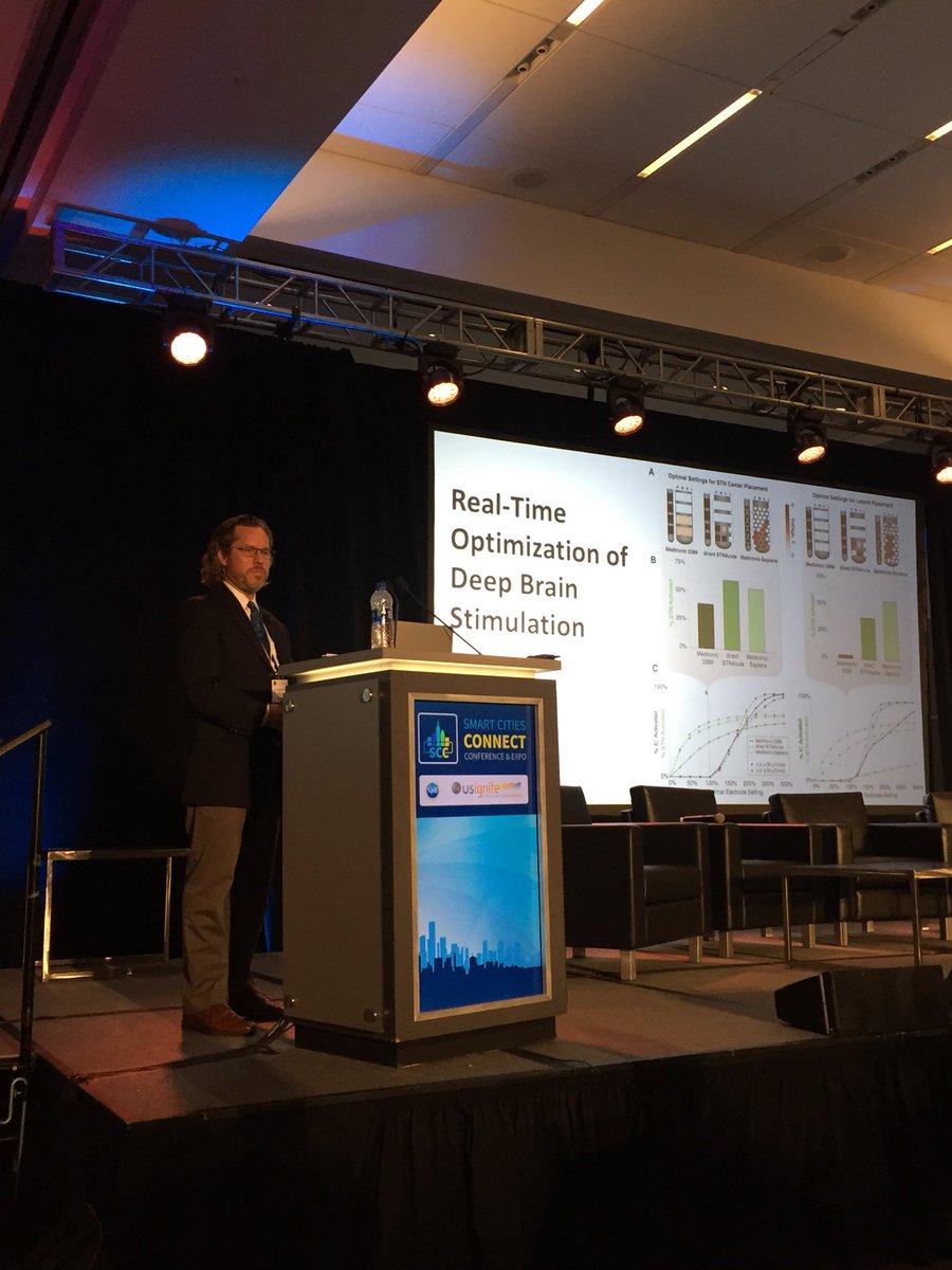 US_Ignite's tweet photo. Chris Buston from @UUtah is giving the crowd at #IgniteAppSummit a demo of his program on Deep Brain Stimulation. Users like neurologists and home health pros will have access to this tech in real time. https://t.co/ml1HnETOoy