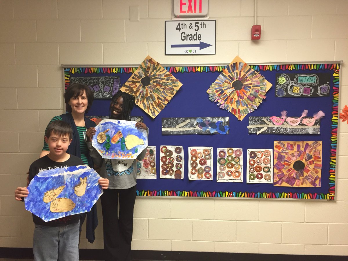 Ms. Wendy, our own award winning adaptive art teacher, with a display of our creative work! @MPE_Mustangs  @FCS_AdaptiveArt