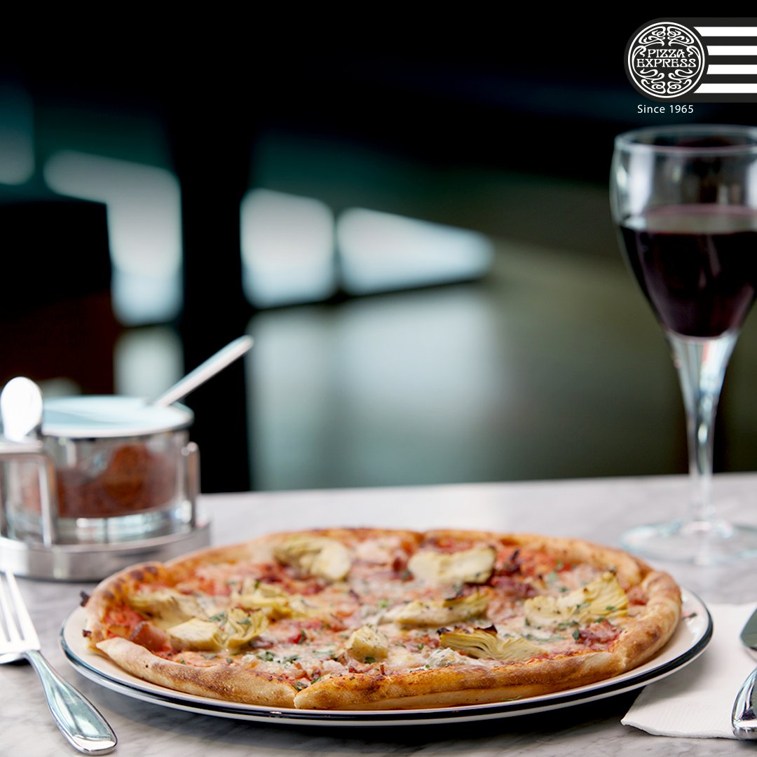 PizzaExpressIN's tweet photo. A slice a day keeps the gloom at bay! #PizzaExpressIn https://t.co/LB9mpRoEps
