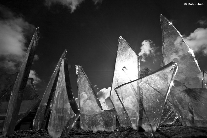 LLAIndia's tweet photo. #B&amp;WPhotography Broken glass protrude like tall sky scrapers questioning the consequences of modernization and development. 
This picture by @RahulJain makes us ponder about society and where it is heading. https://t.co/bXJFoUBQ5f