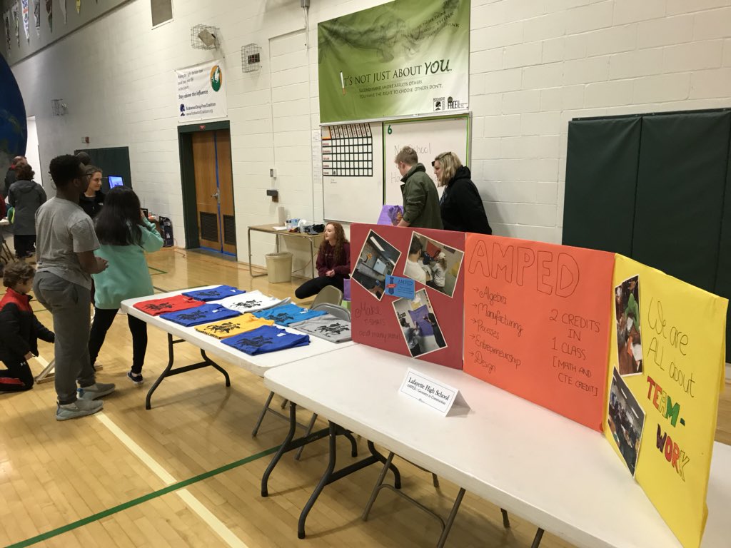 Our awesome AMPED students helped out at the elementary school #STEM night tonight to show what our class is all about.  Attendees launched ping pong balls at a target for a chance to win a shirt made by our students! #connectedlancer <a href="/MrBeaverLHS/">Scott Beaver</a>