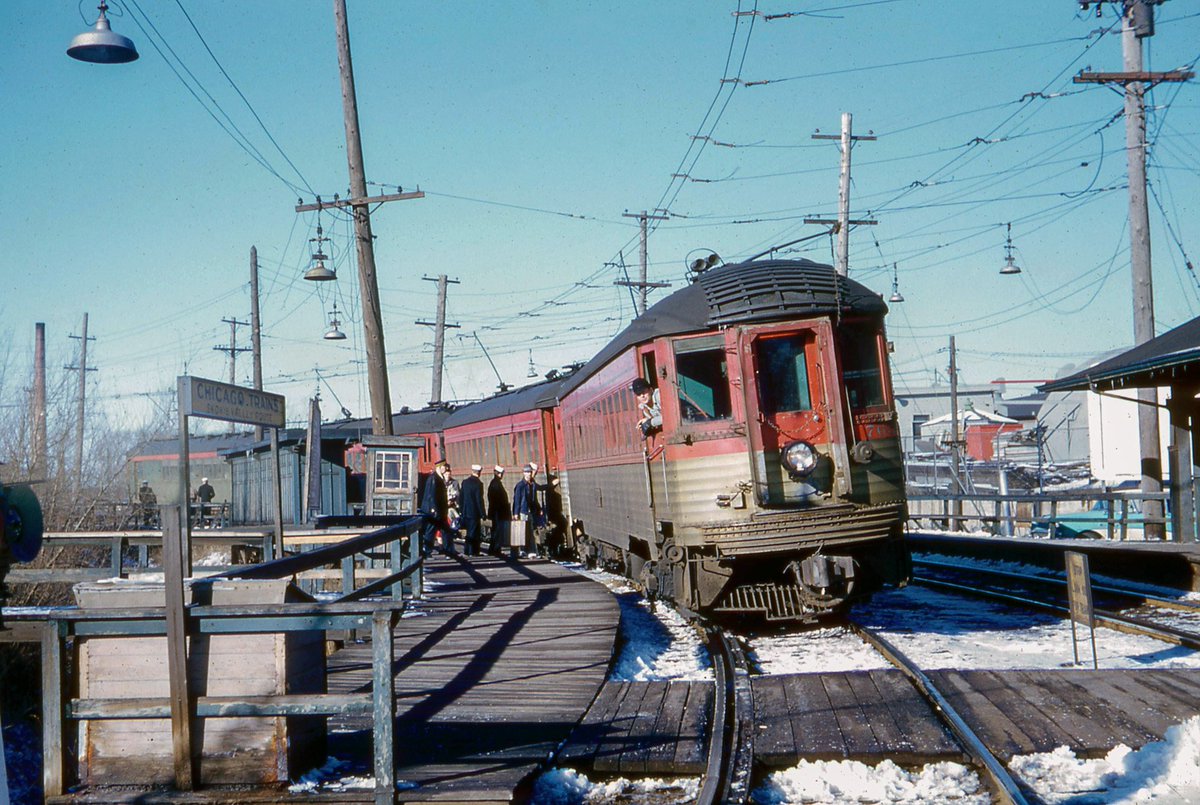 1960. It was about 1 o'clock on a cool, crisp, sunny  Saturday afternoon at the Lake Bluff stop of the Chicago, North Shore  and Milwaukee interurban railroad.   Kodachrome by William D. Volkmer. #historicphotography #photography #streetphotography #goodmorning