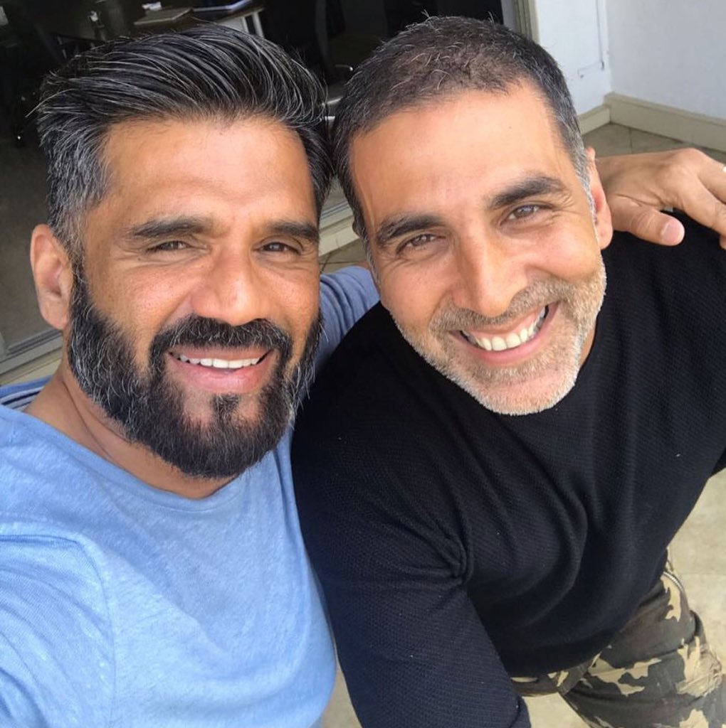 filmfare's tweet photo. RT if you want to see these two together on-screen again! @akshaykumar  @SunielVShetty https://t.co/U5FS7xi6et
