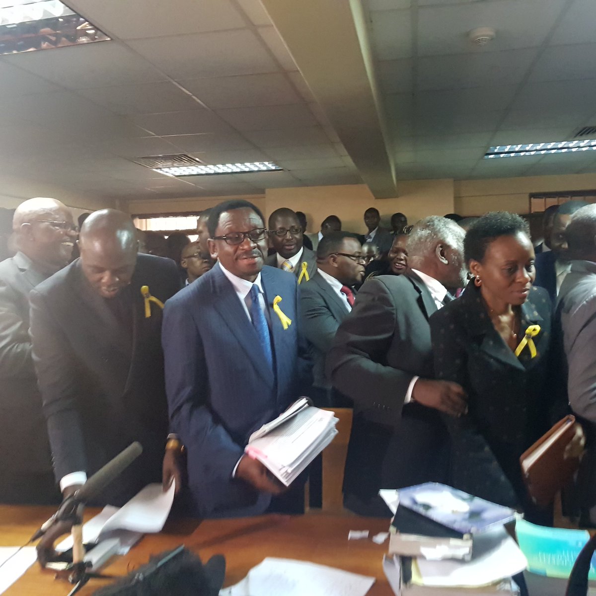 Soni_Methu's tweet photo. Back at #MilimaniHighCourt 12.15. Court gives respondents lawyer an hour to reach his clients before a rulling is made on a case against 3 top government in contempt of law. #MigunaMiguna https://t.co/av6pH6442e