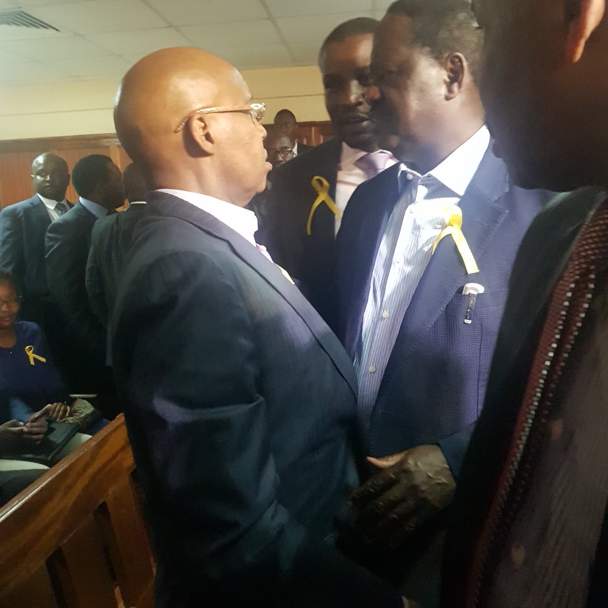 Soni_Methu's tweet photo. Back at #MilimaniHighCourt 12.15. Court gives respondents lawyer an hour to reach his clients before a rulling is made on a case against 3 top government in contempt of law. #MigunaMiguna https://t.co/av6pH6442e