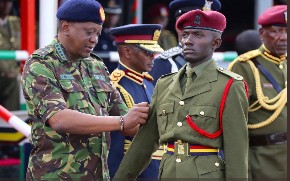 sophienkatha's tweet photo. My young bro, Ken Gitonga receiving an award from president for being the best marksman #GSUPassOut https://t.co/yG2ZElWbg5