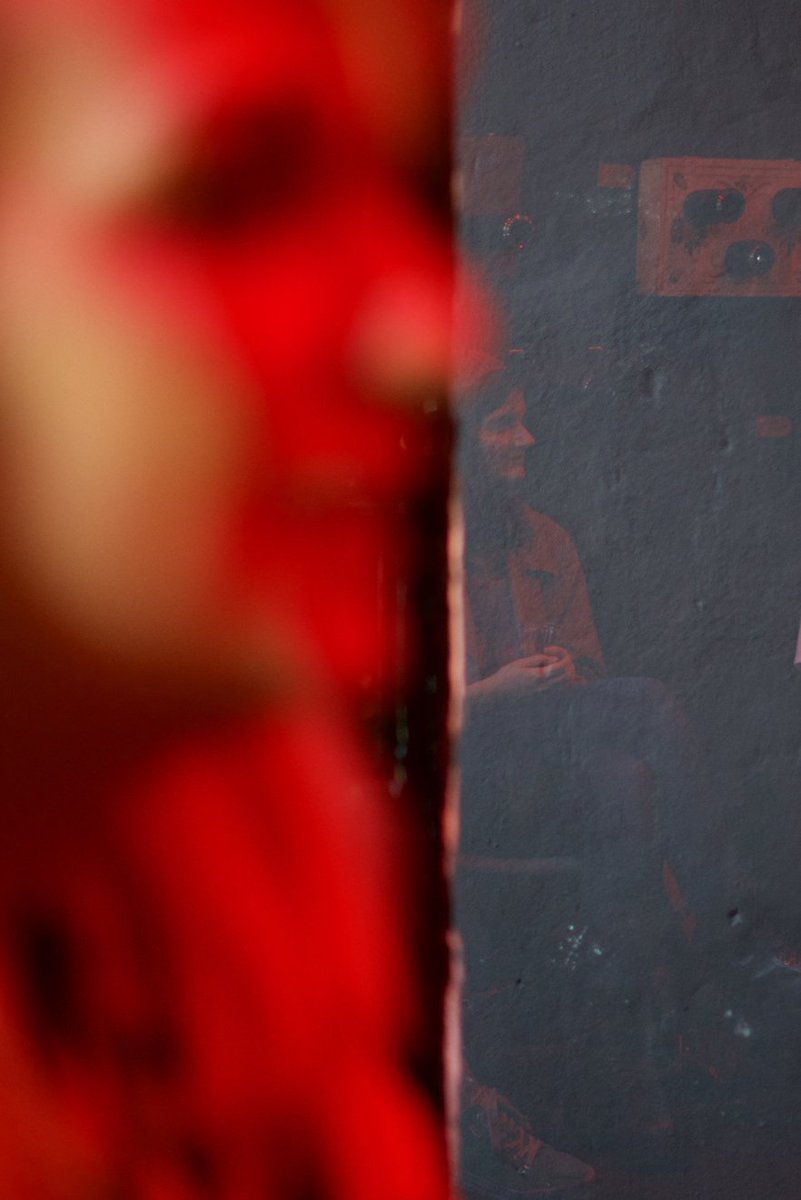 Excellent evening in the company of <a href="/EHagikalfa/">Evagelia Hagikalfa</a> <a href="/playdeadgallery/">playdead</a> discussing; listening &amp; thinking about #microcosmos highly recommended show. I'm not much of a portrait photographer, but here's the wonderful artist herself bathed in the darkroom light @Fujifilm_UK #artist #XT1