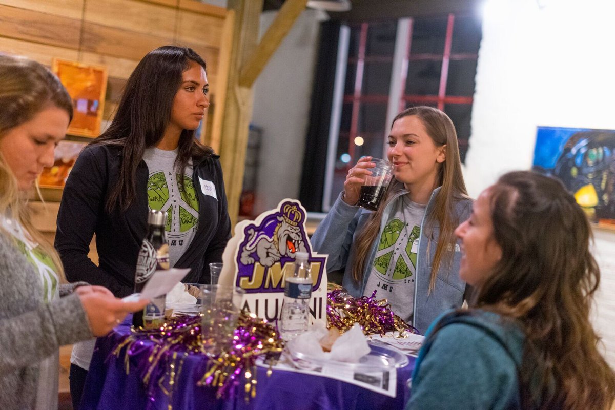 JMUAlumni's tweet photo. #TBT to the #MadisonNetwork event in Nashville during spring break! Alums and #JMUAlternativeSpringBreak students came to enjoy an evening of connection, conversation and engagement during a TEDTalk inspired presentation on non-profit work. Go Dukes! https://t.co/oZy947QSbG