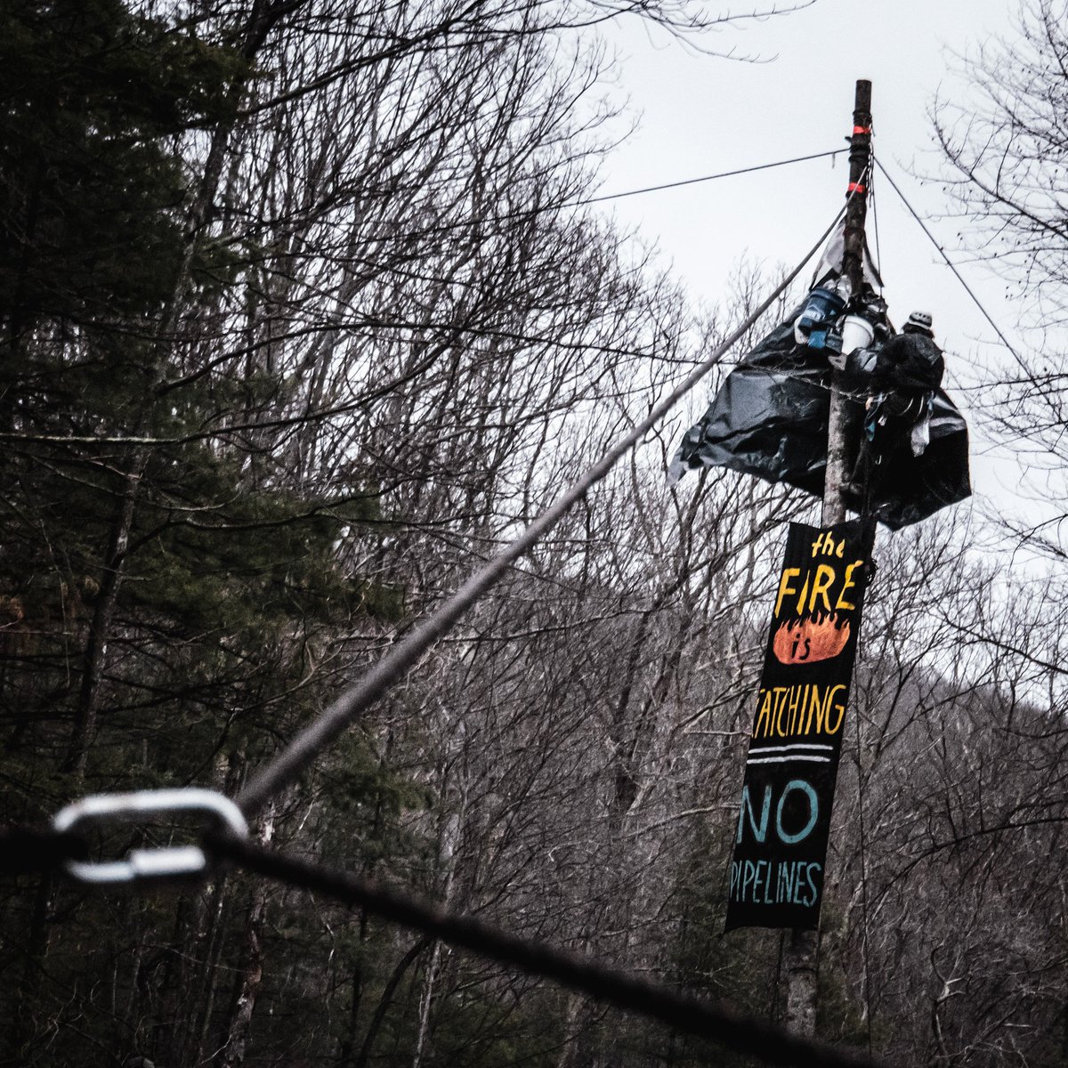 Aerial blockade and rally on MVP access rd in Jefferson National Forest,  on the eastern slopes of Peters Mountain preventing state vehicles  &amp; Mountain Valley #Pipeline personnel from  accessing tree sits on  Peters Mtn &amp; from constructing MVP access road #StoptheMVP #NoMVP