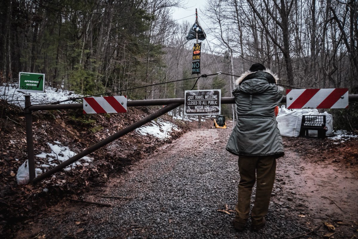 Aerial blockade and rally on MVP access rd in Jefferson National Forest,  on the eastern slopes of Peters Mountain preventing state vehicles  &amp; Mountain Valley #Pipeline personnel from  accessing tree sits on  Peters Mtn &amp; from constructing MVP access road #StoptheMVP #NoMVP
