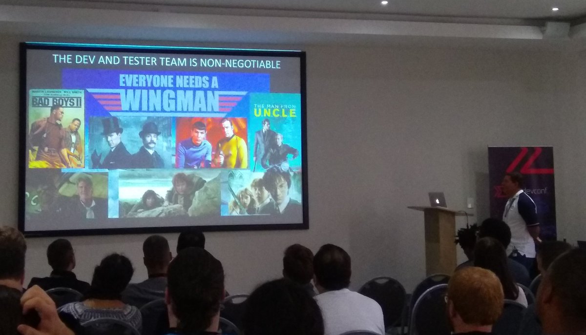 <a href="/MarioMatthee/">Mario Matthee (DVT)</a> speaking at <a href="/devconfza/">DevConf</a> Cape Town 2018 about how software developers and testers can work together better to deliver great software. Some relatable and familiar stories. Nice talk. #SoftwareDevelopment #QA #Testing #Teams #Teamwork #devconf2018