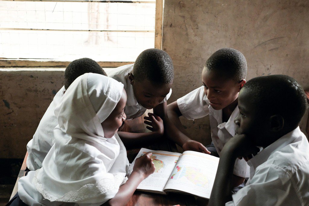 Rebecca Crook, All eyes on this girl as she reads from her geography text at Kilombero Primary School, Tanzania, 2016