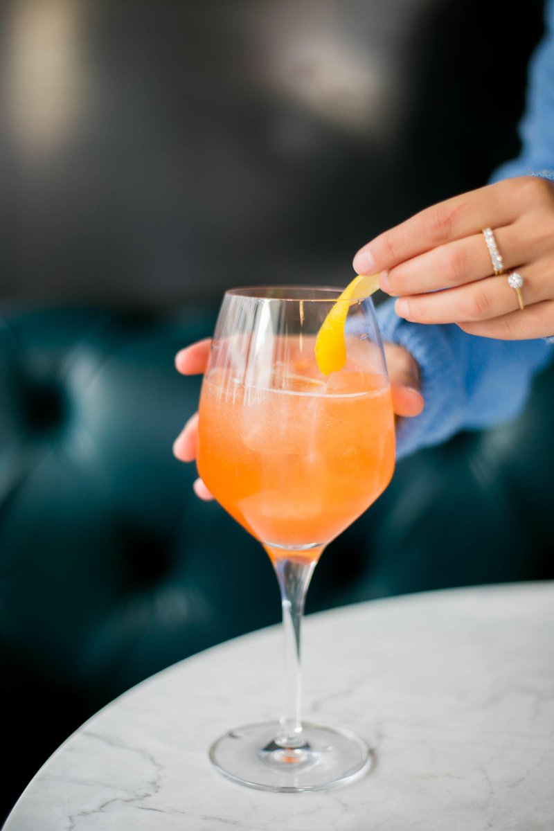 It's a beautiful day for A Beautiful Life. This sweet concoction includes Aperol, Elderflower Liqueur, Brut Cava, and Lime.
