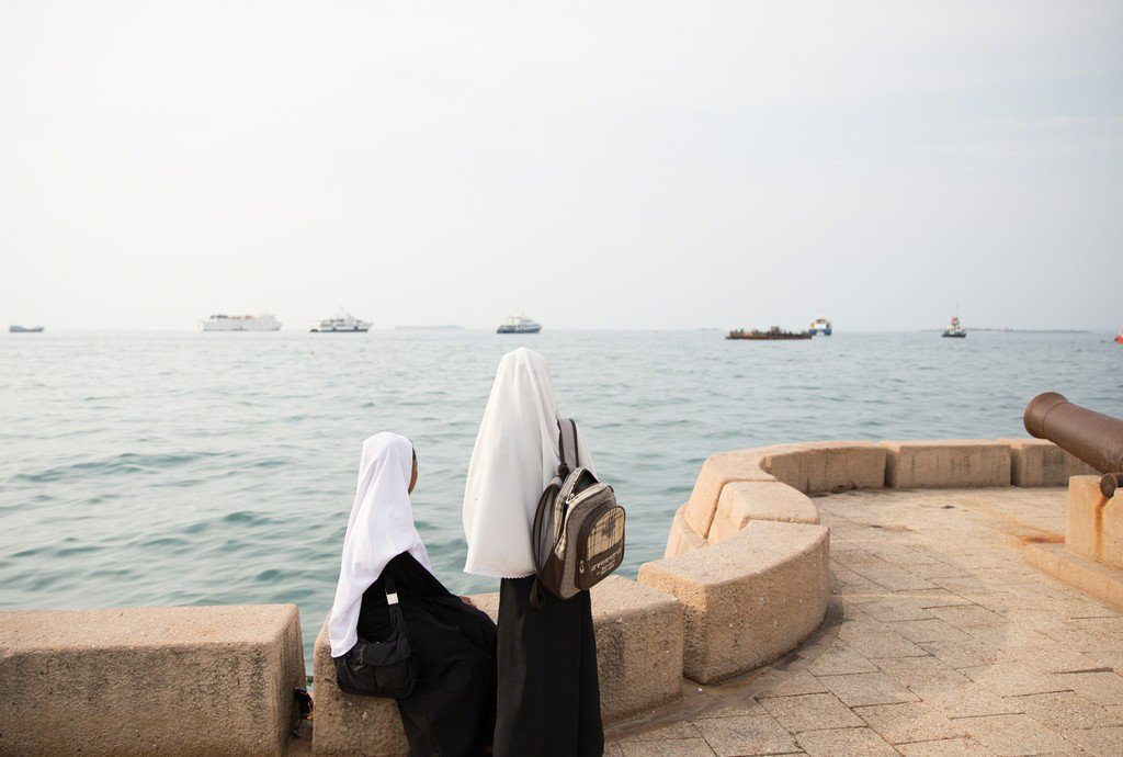 Rebecca Crook, Two students enjoy Forodhani Gardens after school in Stonetown, Zanzibar, 2016