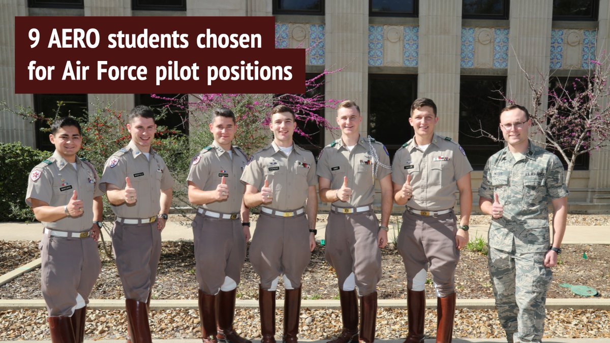 Seven Aggies standing in cadet uniforms