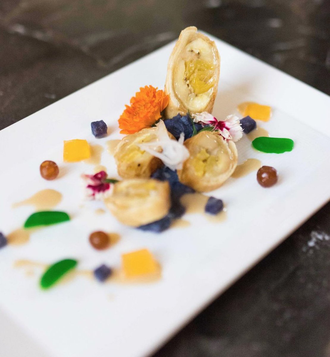 NOWFE's tweet photo. 2018, Day 3, Dish 16: Purple Yam, Sweet Coconut Grit Cake, Banana and Jackfruit Eggroll, Sugar Palm Fruit with Caramelized Coconut Sauce. By Chef Tony Marinas @hyattneworleans. #NOWFE2018 #NOWFE #EatingNOWFE #NOWFEculinaryawards https://t.co/JHTYThR6Ru