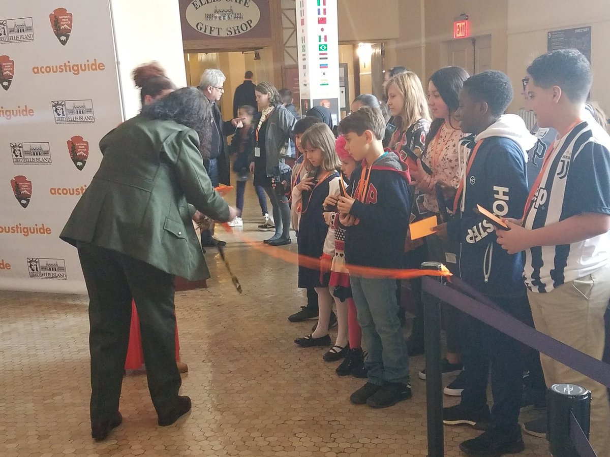 AcoustiguideA's tweet photo. A grand morning to celebrate the launch @EllisIslandNPS @StatueEllisFdn @acoustiguide audio experience.  Kids of all backgrounds came to take the family  tour..and there was even a ribbon cutting! https://t.co/sxno6Y097W
