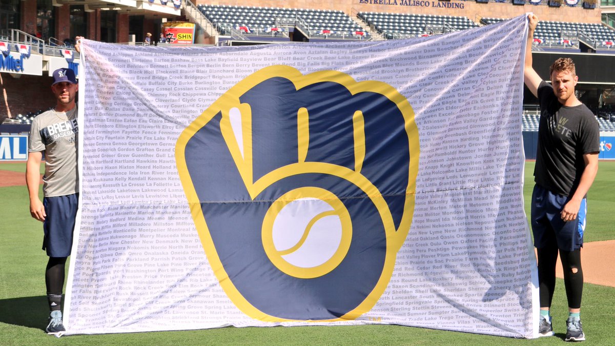 Brewers's tweet photo. Introducing the newest member of our traveling party...

This flag bears the name of every city in Wisconsin so we can carry you with us wherever go.

#ThisIsMyCrew https://t.co/c3Fhxb2Yjv