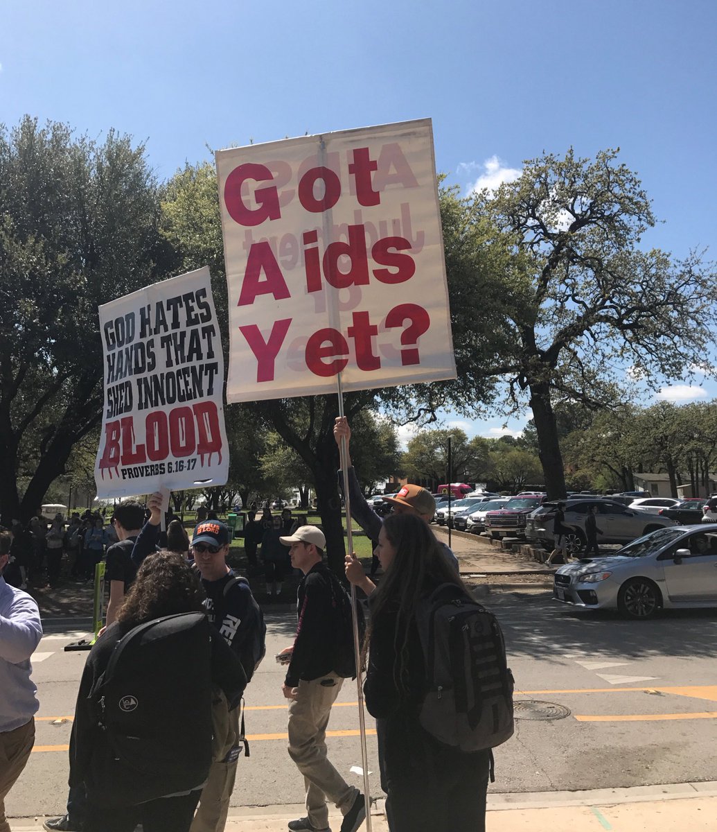 ntdaily's tweet photo. People have gathered on UNT’s library mall where protestors are carrying signs reading “Got Aids yet?” and “BLM are racist thugs.” Our reporter @nikkinikxo is at the scene. Protestors will not disclose what group/organization they belong to. https://t.co/sZI1mwnzpY