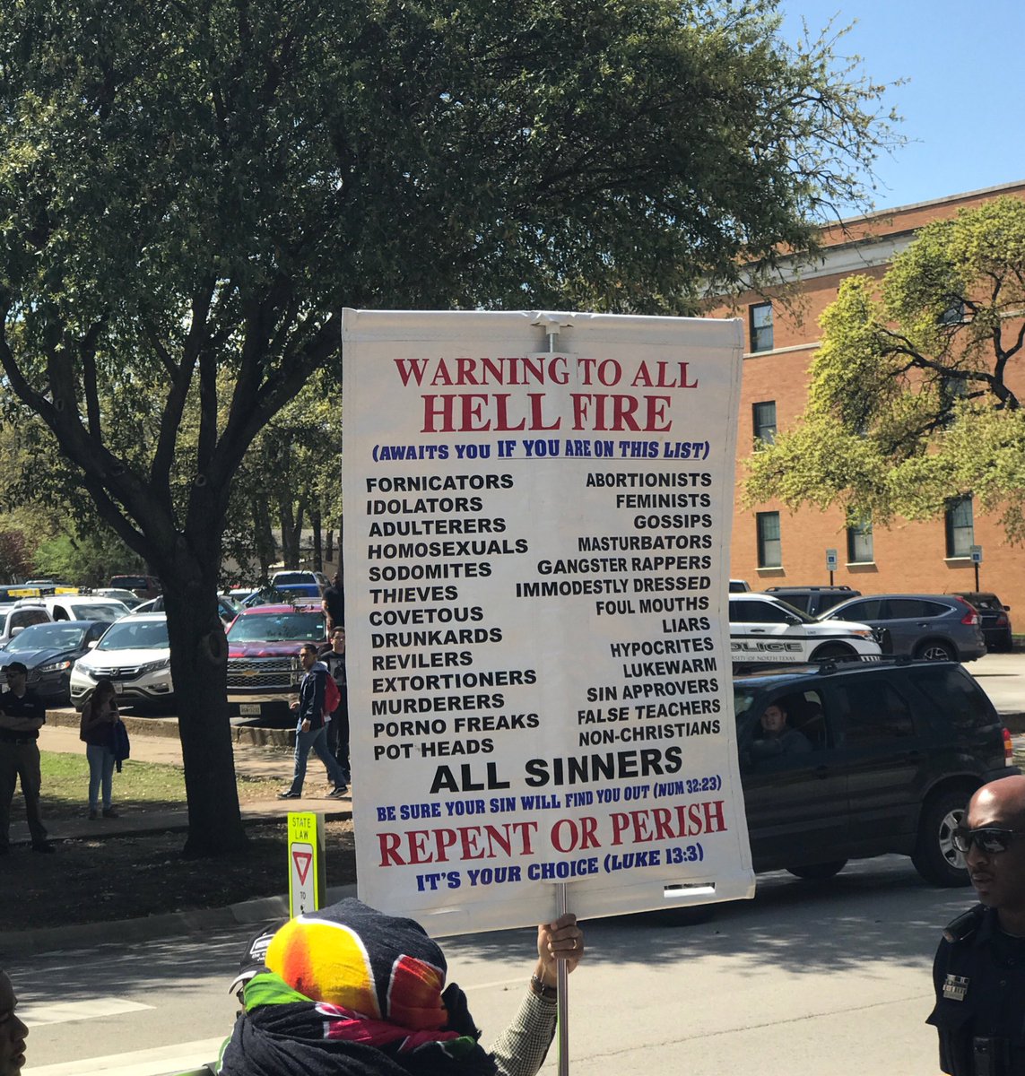 ntdaily's tweet photo. People have gathered on UNT’s library mall where protestors are carrying signs reading “Got Aids yet?” and “BLM are racist thugs.” Our reporter @nikkinikxo is at the scene. Protestors will not disclose what group/organization they belong to. https://t.co/sZI1mwnzpY