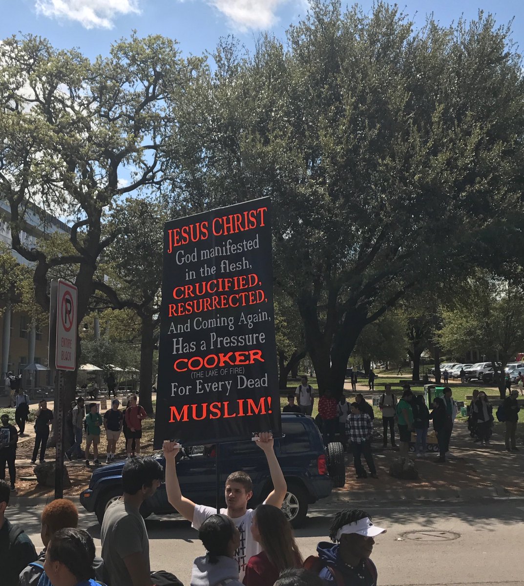 ntdaily's tweet photo. People have gathered on UNT’s library mall where protestors are carrying signs reading “Got Aids yet?” and “BLM are racist thugs.” Our reporter @nikkinikxo is at the scene. Protestors will not disclose what group/organization they belong to. https://t.co/sZI1mwnzpY