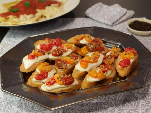 LoveThatOliveMG's tweet photo. Bruschetta is such a simple yet delicious dish.  We're loving this Cheesy Tomato Bruschetta!
https://t.co/hL6ax2dI97 https://t.co/E33qFbUZD7