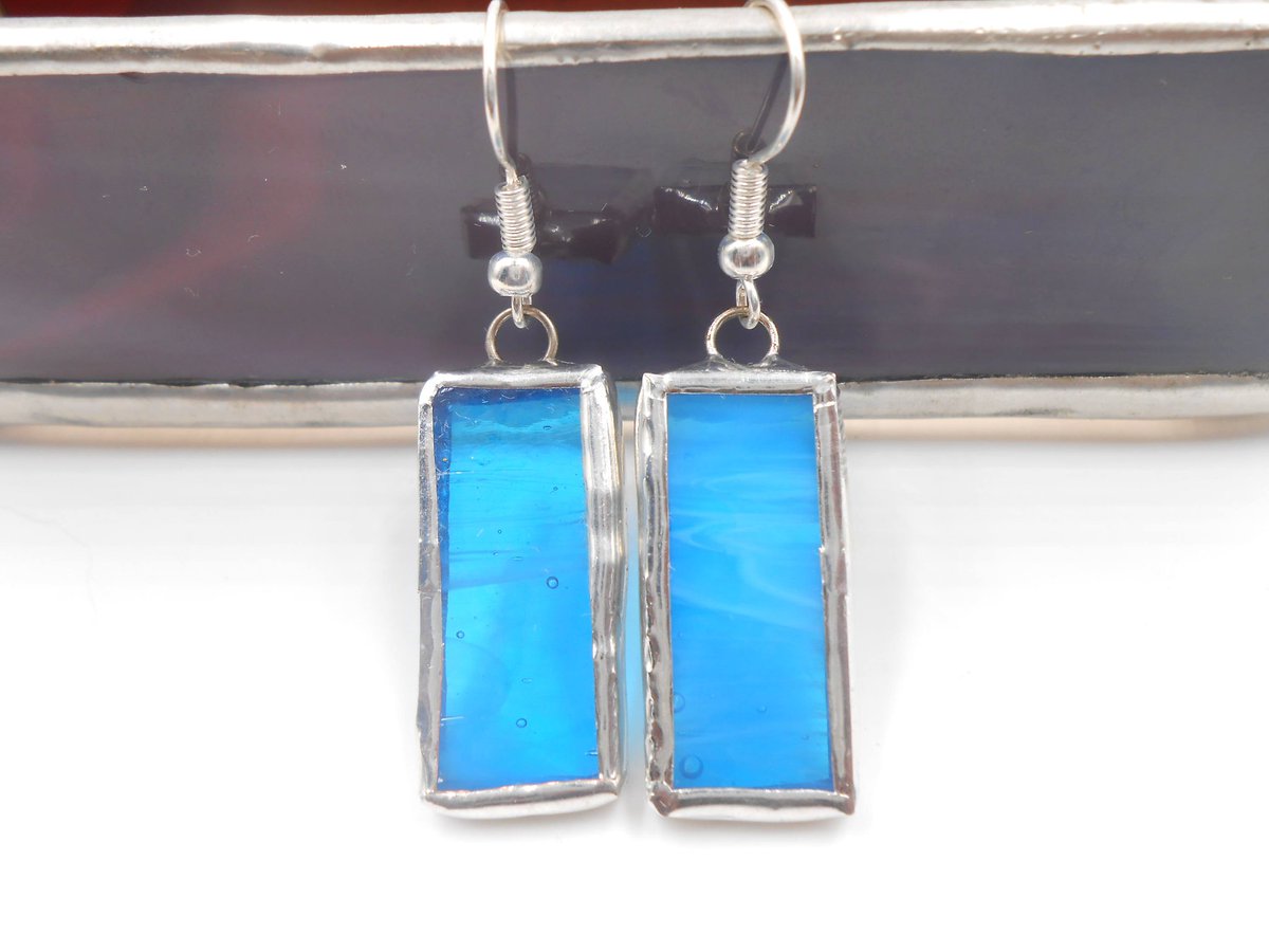 TrianglularRain's tweet photo. Excited to share one of the latest additions to my #etsy shop: Turquoise Blue Sky Stained Glass Earrings #jewelry #earrings #boho #blue #fashion #style #womaninbiz #BlackGirlMagic #shopping #TriangularRainbows #indigoflame #springfashion #handmadejewelry https://t.co/p5zR4FjiXg https://t.co/VVhOA40Qeo