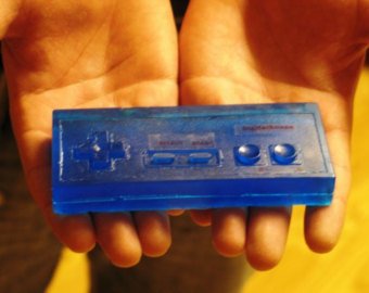 DigitalSoaps's tweet photo. Happy Throwback Thursday! Today we take a look at our very first NES controller soap and compare it with our current ultra realistic design. https://t.co/44wGTtXbnJ https://t.co/zTSPUMbOwi