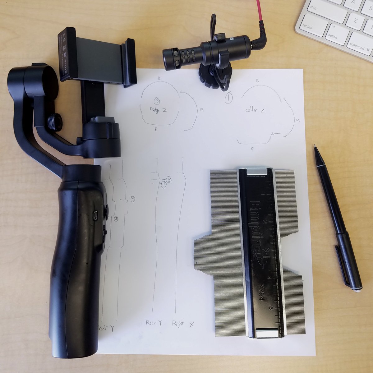 Alan__Dennis's tweet photo. I have a #SmoothQ camera stabilizer and want to attach a #RodeMicro microphone. I need a way to join the two and #3Dprinting  a mount seems like a great solution, but I don't have a capable #3DScanner. Tracing scans from an old fashioned contour gauge to the rescue! https://t.co/S4gbo8ZuJw