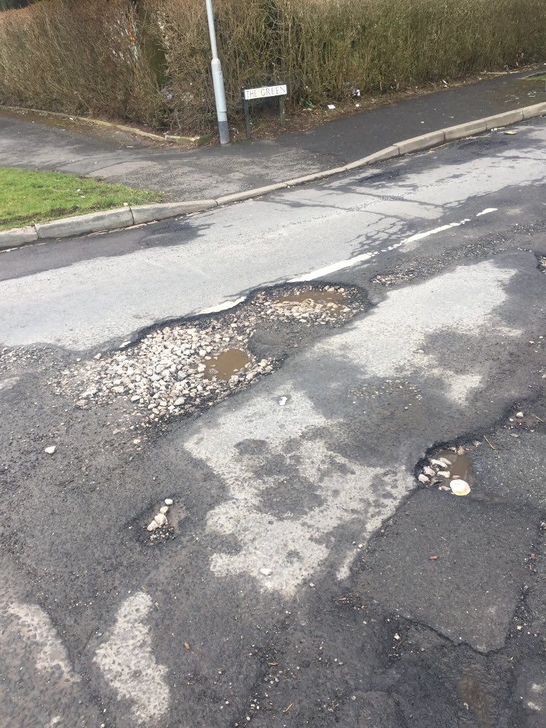 cmillicent's tweet photo. @OldhamCouncil The Green Fitton Hill disgraceful road surface #potholes #craters https://t.co/cb8pGDESy4