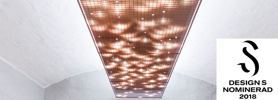 The suspended ceiling made of  copper at the Uppsala University main   building is nominated to the Design S awards, category Light &amp;   Lightening. More photos and information here: aix.se/ljusdusch-desi… 
<a href="/AIX_Arkitekter/">AIX Arkitekter</a> <a href="/Bjerking_AB/">Bjerking</a> #Design_S <a href="/uppsalauni/">Uppsala universitet</a> #statensfastighetsverk