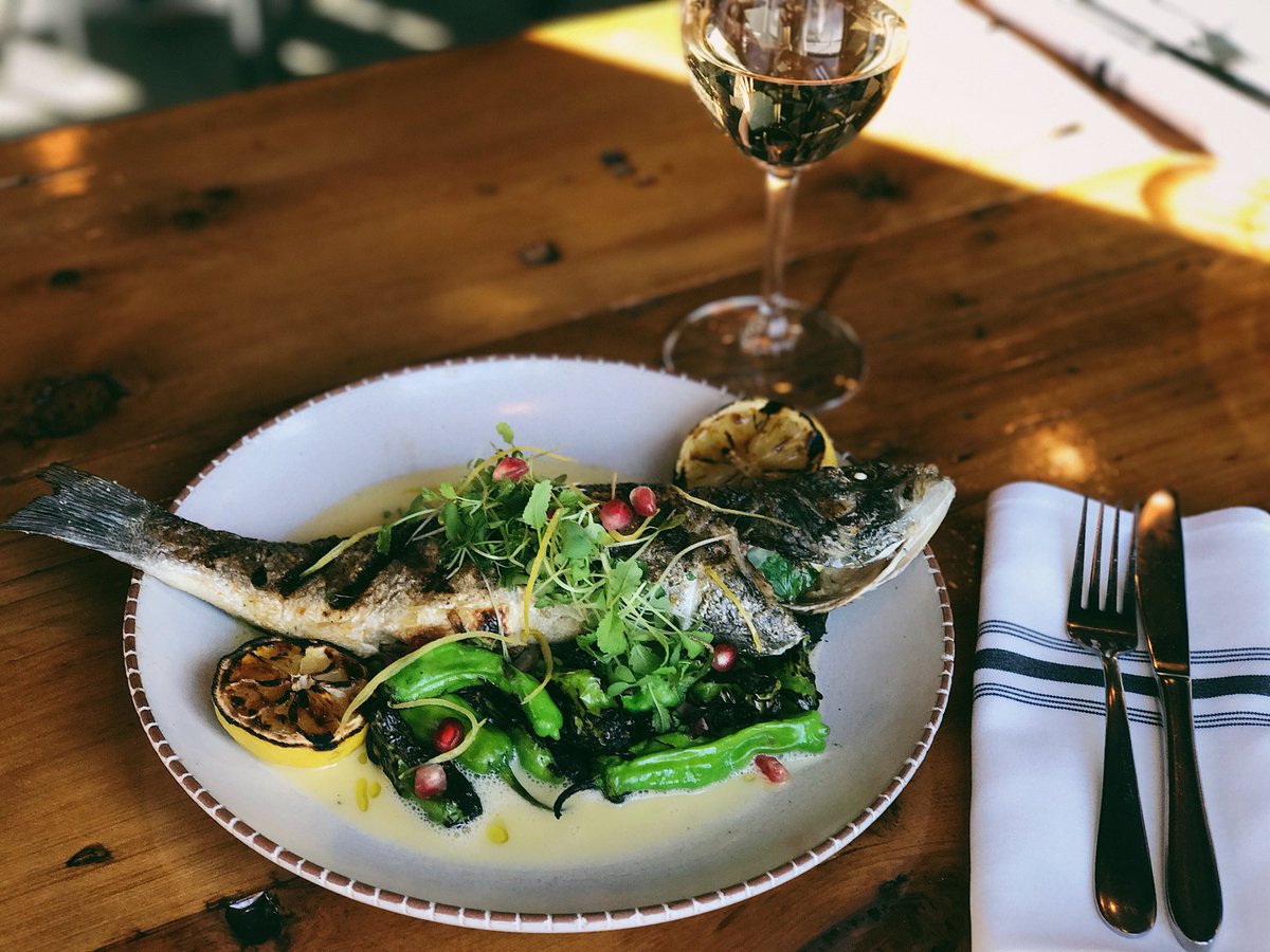 Good Friday! We are bringing you a beautiful fish dinner to fit the day. Citrus &amp; Fennel stuffed Branzino, w/ blistered shishito peppers and lemon beurre blanc! Available tonight only.