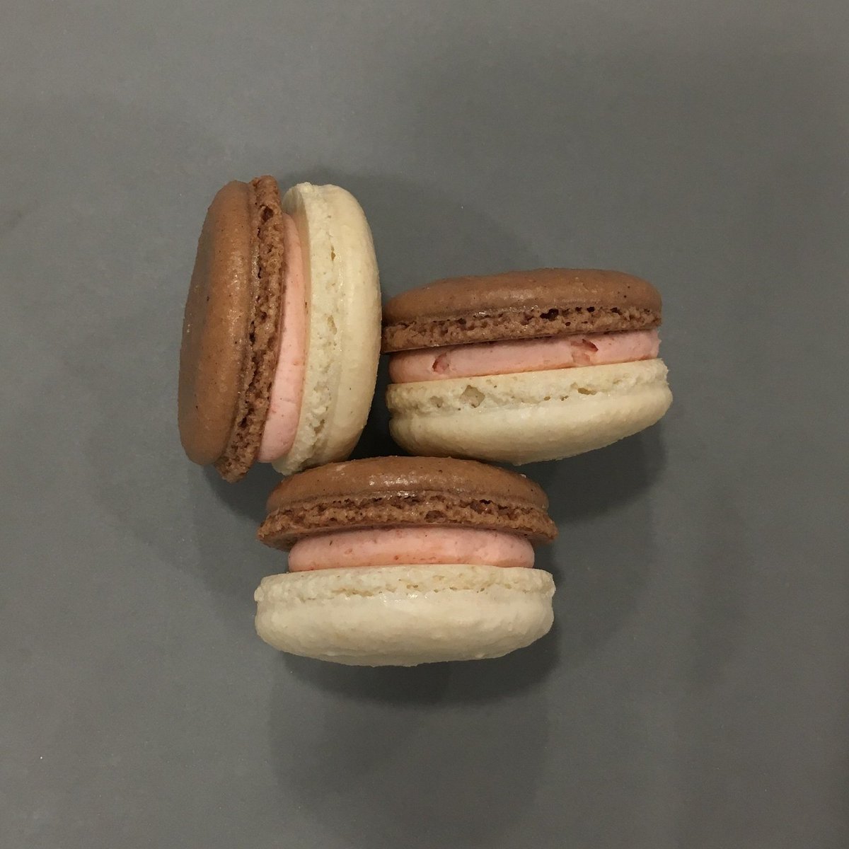 We added a new macaron flavor to our table this weekend at the <a href="/broadwaymkt/">The Broadway Market</a>...Neapolitan! Chocolate &amp; vanilla shells sandwich strawberry buttercream and a dollop of chocolate ganache. A triple flavor combo created just for you! #blueeyedbaker #bakersgonnabake #shoplocal#buffalove