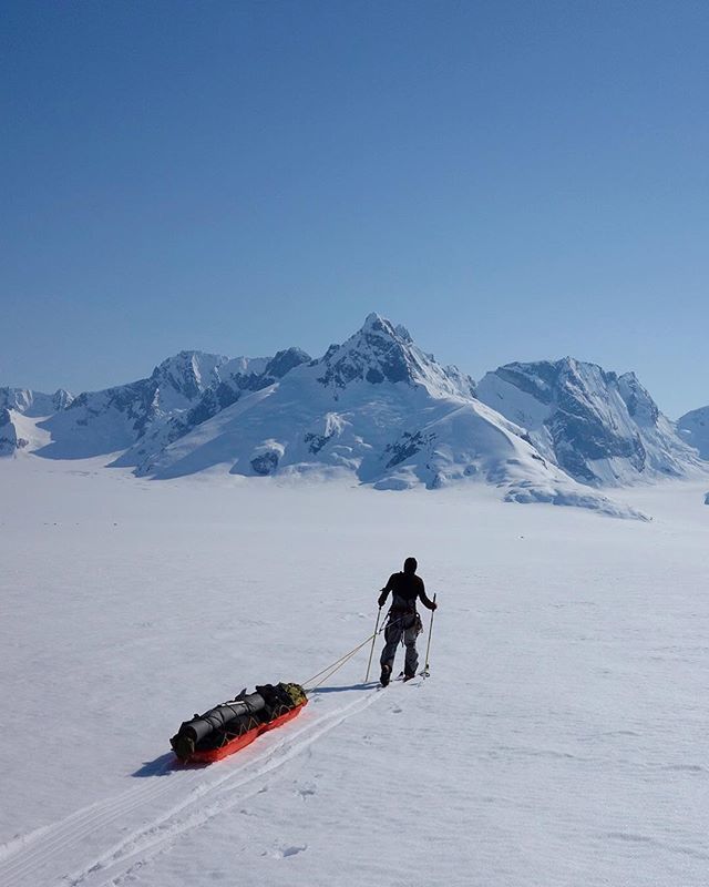 Ice_Legacy's tweet photo. The peaks were looking even bigger than they were as we were sliding slowly on the the flat icy plain. We thought that we will never reach them, remaining so far away. 📷 @borgeousland https://t.co/Y7P9lqTi4H https://t.co/NwvF9Dio4b