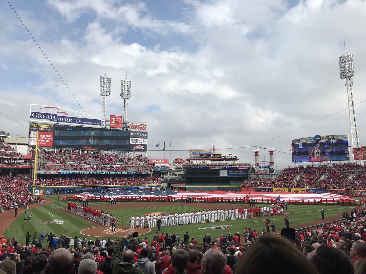 JB_Quackenbush's tweet photo. Happy Opening Day 🇺🇸 SO incredibly proud to be your wife and blessed to be along for this crazy ride with you! Your hard work is second to none, enjoy every minute! #RedsOpeningDay #OpeningDay2018 #TeamQuack @Quack1128 https://t.co/qQ4eMwzLum