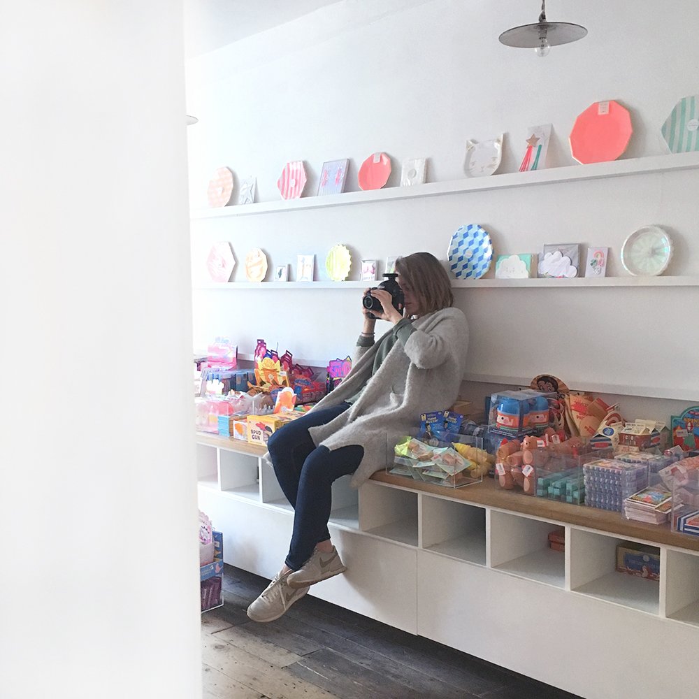 TheHambledon's tweet photo. Spotted: our photographer Amy snapping away in the shop (We'll let her off for sitting on the shelves but only because she's our favourite photo taker!) #justthegoodpeople https://t.co/3Flc2gzgKv