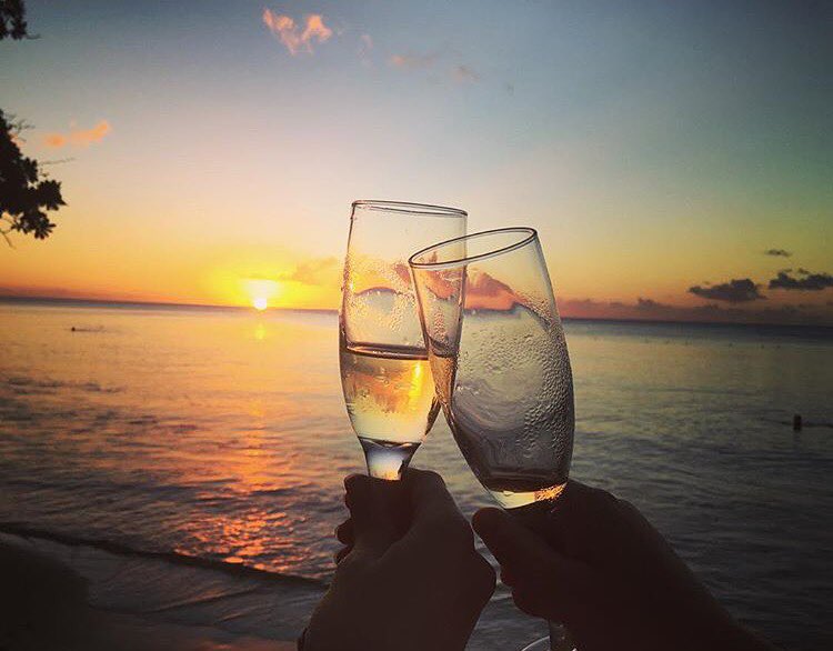 EastWindsHotel's tweet photo. Cheers to the #weekend! #BestSunsetsEver #EastWinds #SaintLucia https://t.co/4Q7c7kwmcm