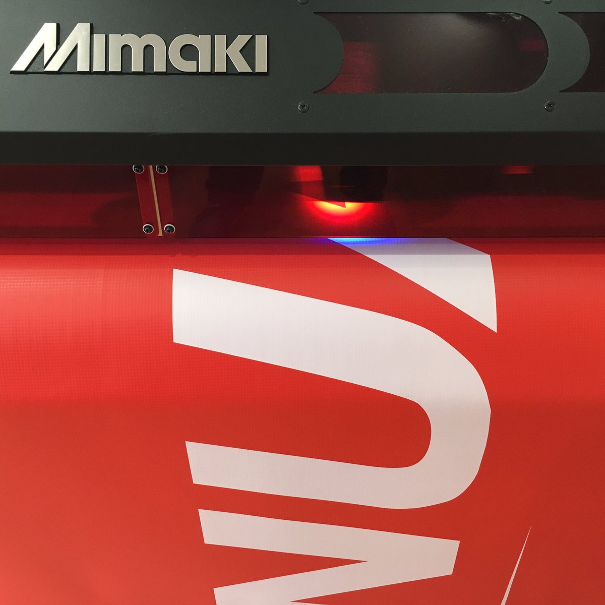 APCink1's tweet photo. Is our @MimakiUSA #UCJV putting down red ink on white banner or white ink on red banner? #whocansay https://t.co/UTcCbKuR03