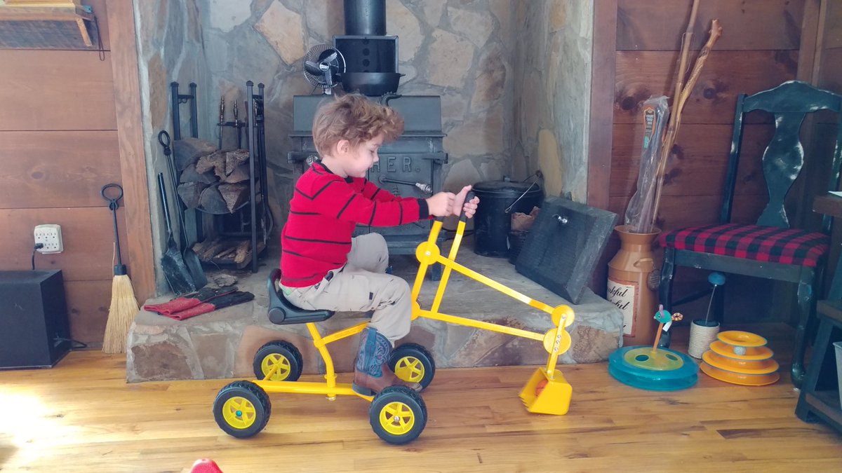 Every now and then, Grammie gets this gift giving thing right. #excavator #lovethathair #Boys
