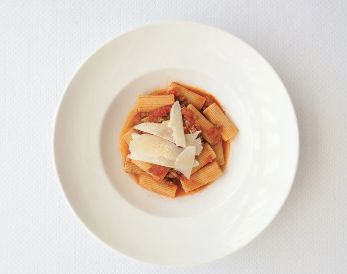 The beef in our Rigatoni Alla Bolognese is slowly braised in order to give it that fall off the bone tenderness and served in a rich #Bolognese tomato sauce, which you can add to any of your dishes at home. Visit us at ilmulino.com/shopnow/
